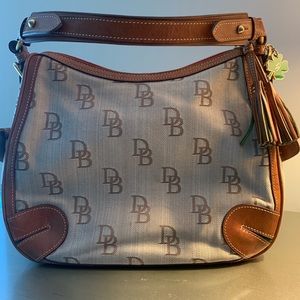 A well kept Dooney & Bourke Hobo Bag with keychain